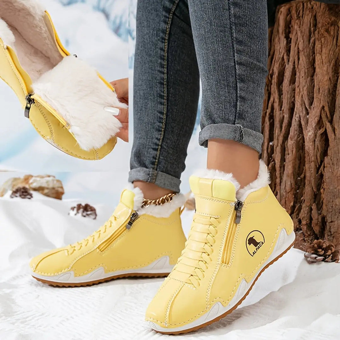 Faux-fur lined women's winter boots, zip closure, providing warmth & comfort in chilly weather.