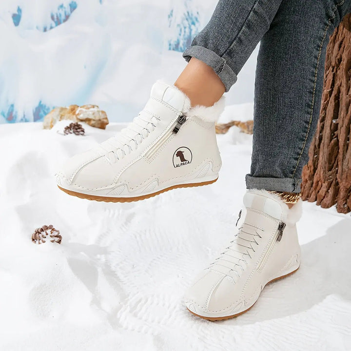 Stylish women's ankle boots, featuring a warm faux-fur lining & easy zip closure for winter wear.