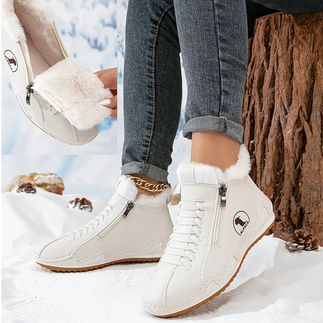 Durable women's snow boots with a wide fit, side zipper, and warm faux-fur for ultimate comfort.