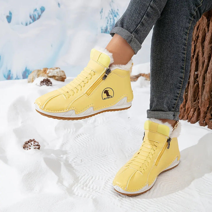 Zip-up women's ankle boots, warm and cozy with faux-fur lining, ideal for winter walking.