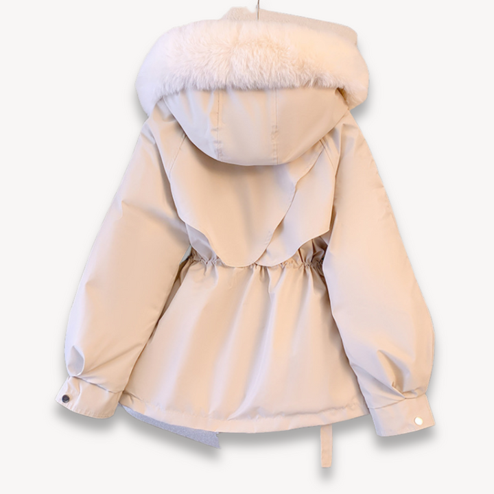 Cozy women's winter parka, a warm coat with a removable hood, ideal for extreme cold weather. Durable outerwear.