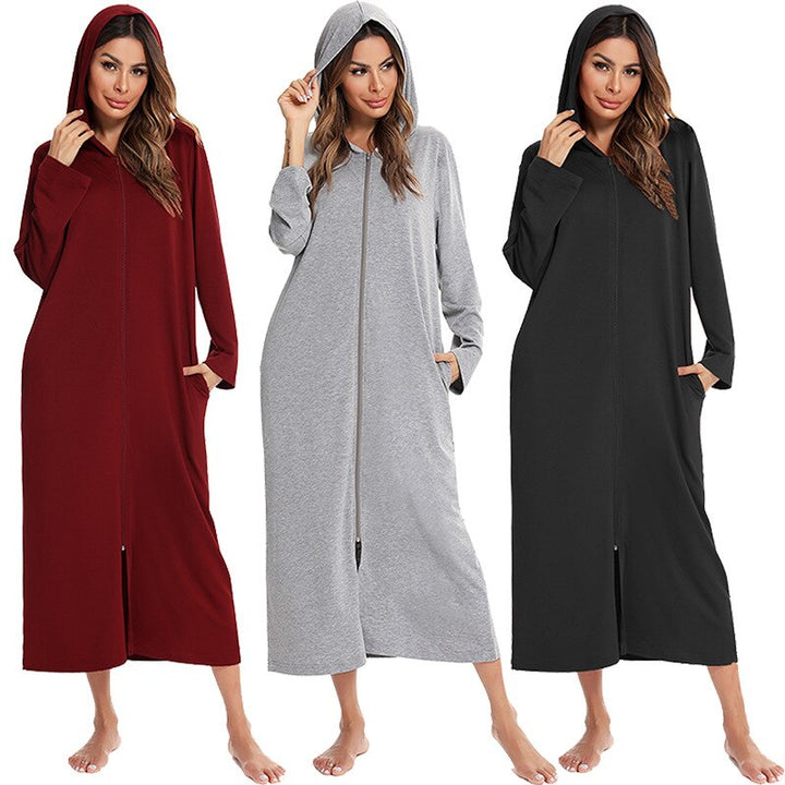 Women's warm zip-up hooded nightdress for cozy winter relaxation.