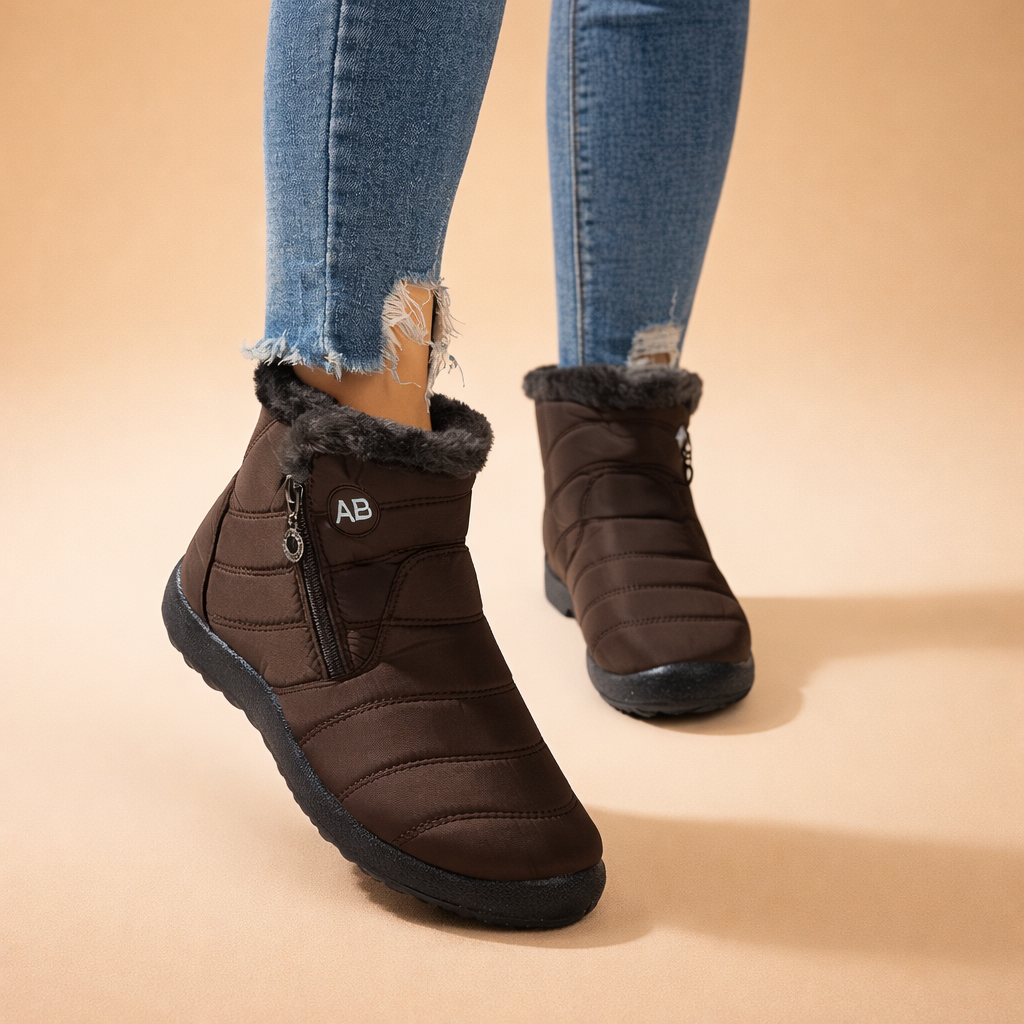 Comfortable women's winter ankle boots with zip closure. Insulated & warm for cold weather protection & everyday wear.