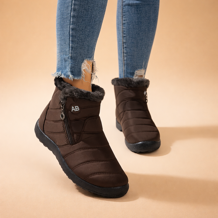 Comfortable women's winter ankle boots with zip closure. Insulated & warm for cold weather protection & everyday wear.