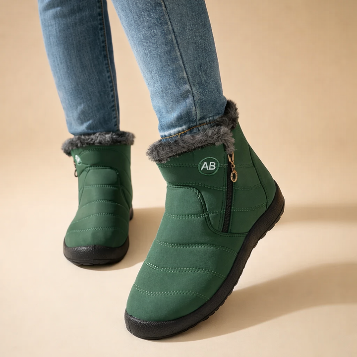 Fashionable women's winter ankle boots with convenient zip-up. Stay warm and comfortable in cold weather.
