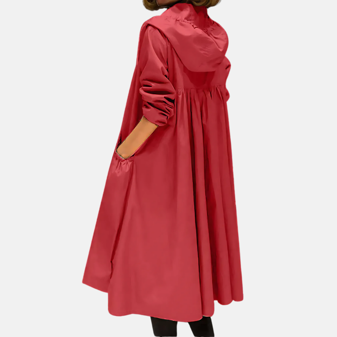 Durable water-resistant women's jacket, knee-length with a hood, offering lightweight protection from rain.