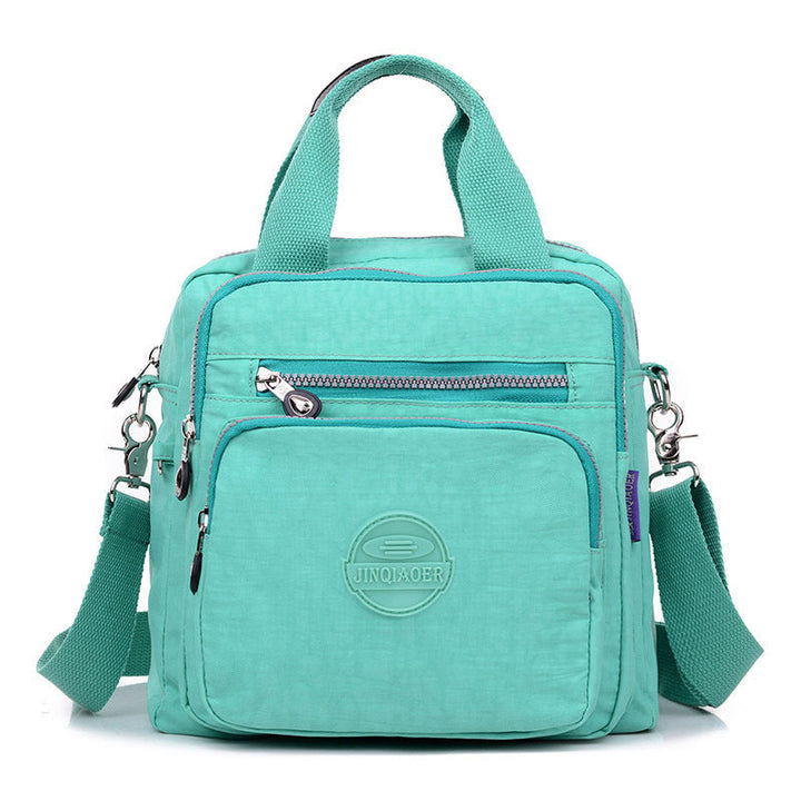Secure women's water-resistant travel crossbody bag, protecting valuables during daily commutes.
