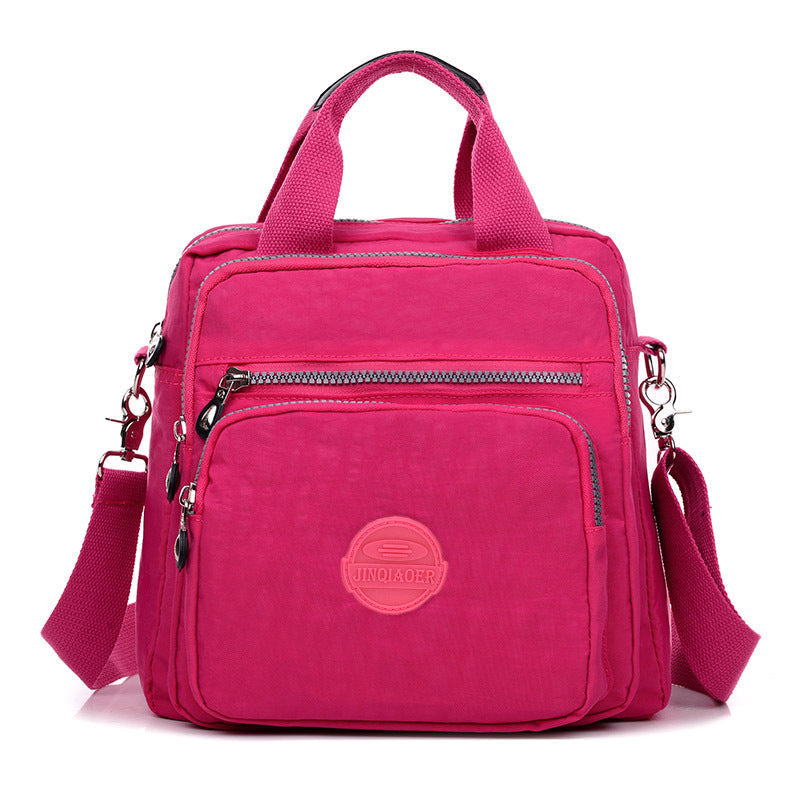 Smartly organized women's water-resistant shoulder bag for efficient, hands-free daily use.