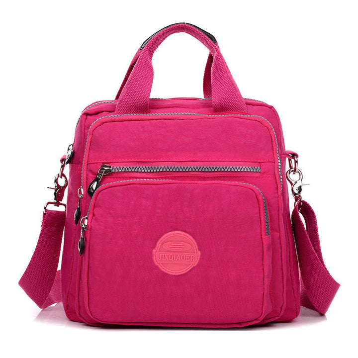 Smartly organized women's water-resistant shoulder bag for efficient, hands-free daily use.
