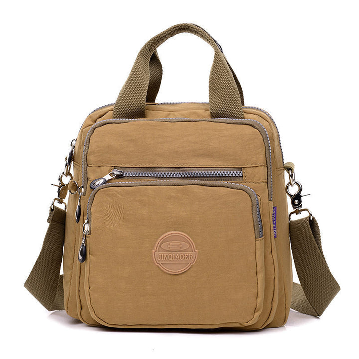 Fashionable and tough water-resistant women's crossbody bag, a durable chic accessory.