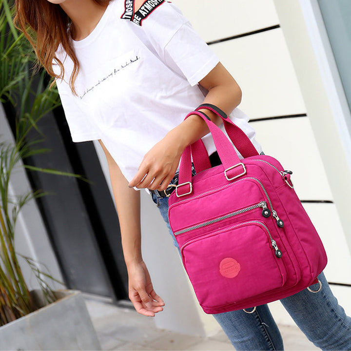 Stylish women's water-resistant crossbody bag, perfect for daily errands & travel adventures.