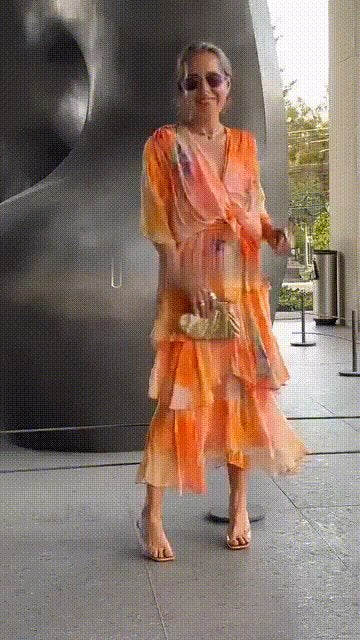 Women's elegant tiered maxi dress, chiffon with watercolour floral print. Perfect long summer party dress.