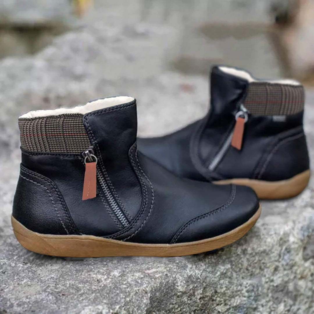 Stylish women's waterproof ankle boots featuring a convenient side zip, perfect for comfortable casual wear.