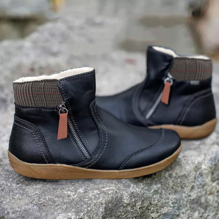 Stylish women's waterproof ankle boots featuring a convenient side zip, perfect for comfortable casual wear.