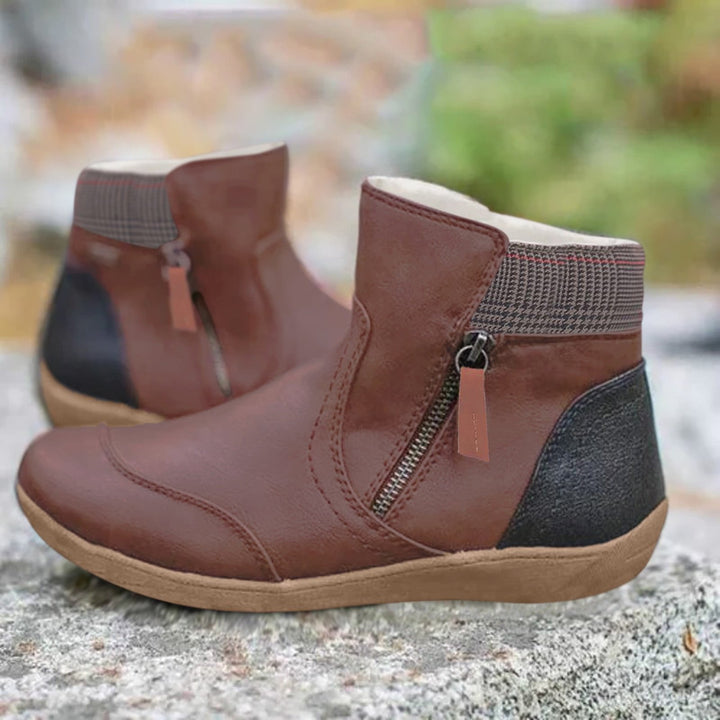 Comfortable women's waterproof ankle boots with side zip for easy wear, providing weatherproof protection.