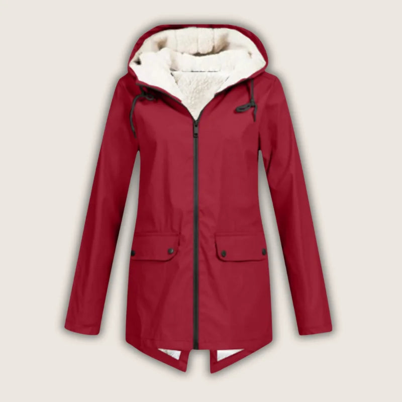 Women's waterproof hooded jacket with front pockets, ideal for rain and outdoor activities.