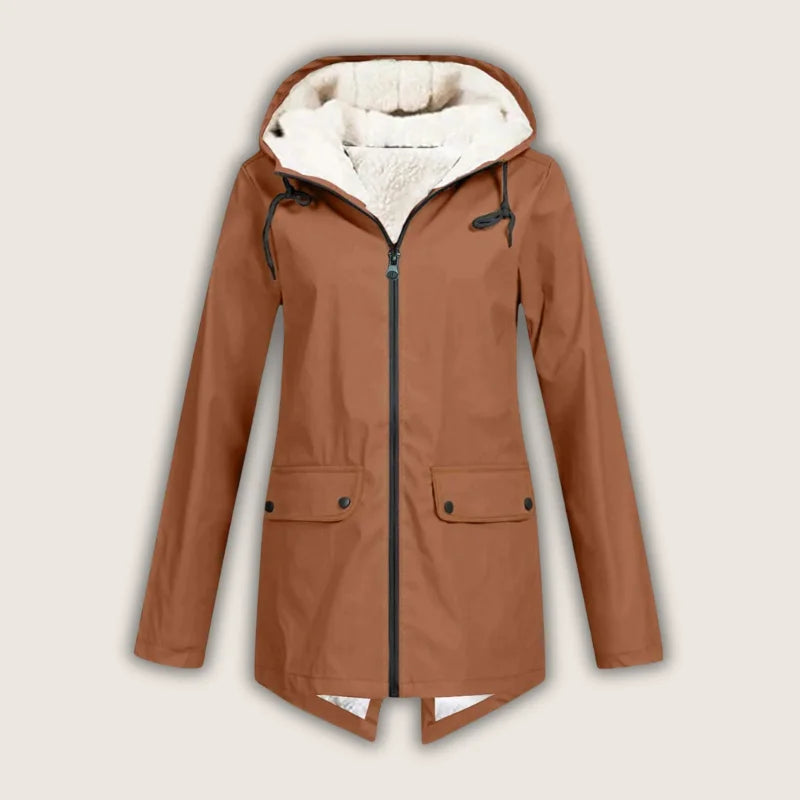 Durable women's waterproof hooded jacket, practical front pockets, essential women's outerwear for all seasons.
