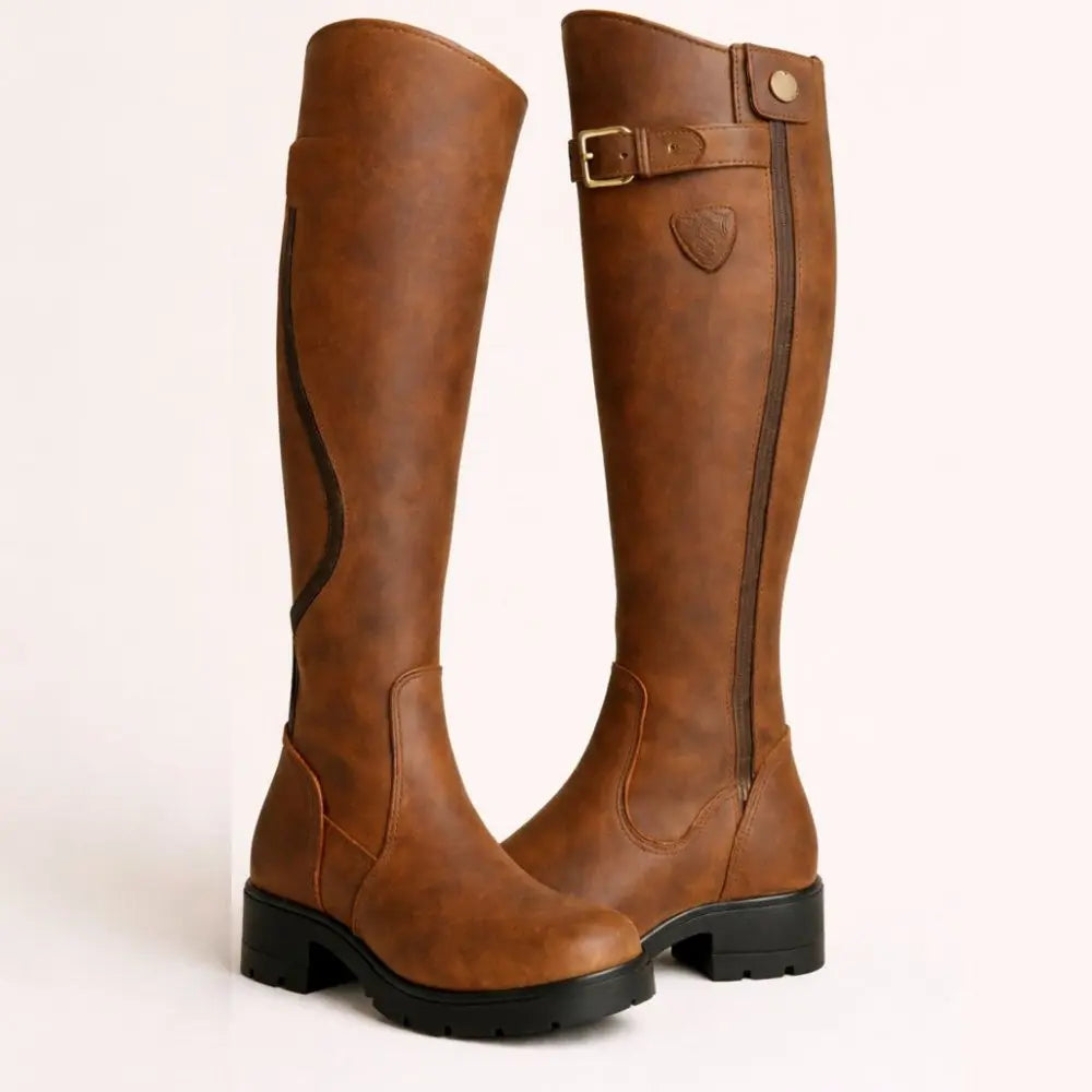 Women's waterproof knee-high boots with convenient side zip, perfect for winter and autumn weather.