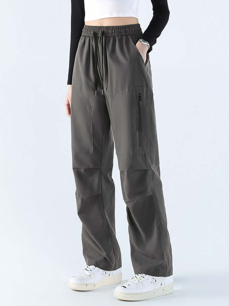Comfortable women's loose fit straight leg waterproof pants, ideal for casual outdoor & rain gear.