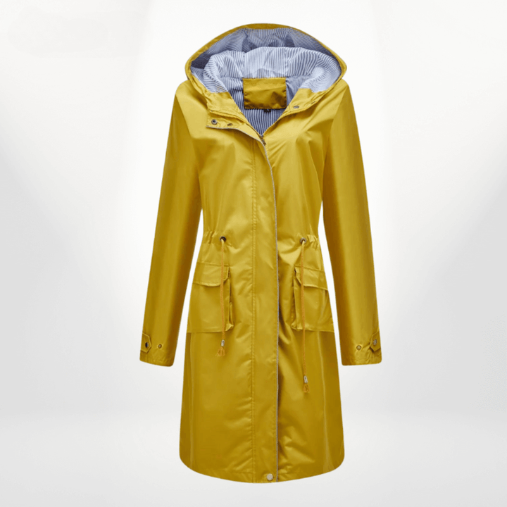 Modern women's over-knee trench coat. Waterproof, stylish long jacket, perfect as elegant all-weather outerwear.