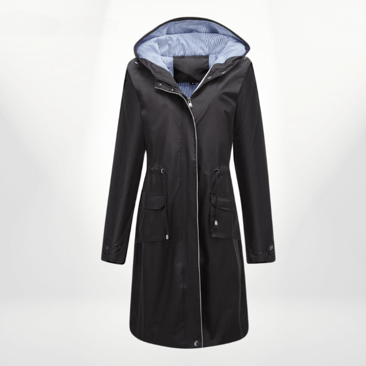 Chic women's over-knee waterproof trench coat. Versatile long jacket, essential stylish outerwear for rainy days.