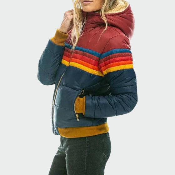 Women's warm waterproof puffer jacket with secure zipper. Fashionable and functional winter outerwear for cold days.