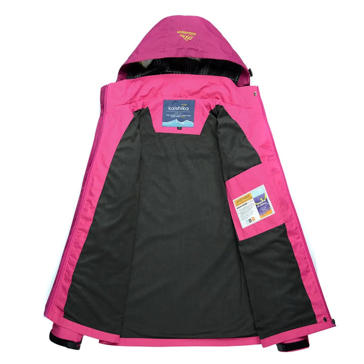 Stylish women's hooded quilted jacket, waterproof and lightweight. Perfect travel or outdoor jacket for active adventures.