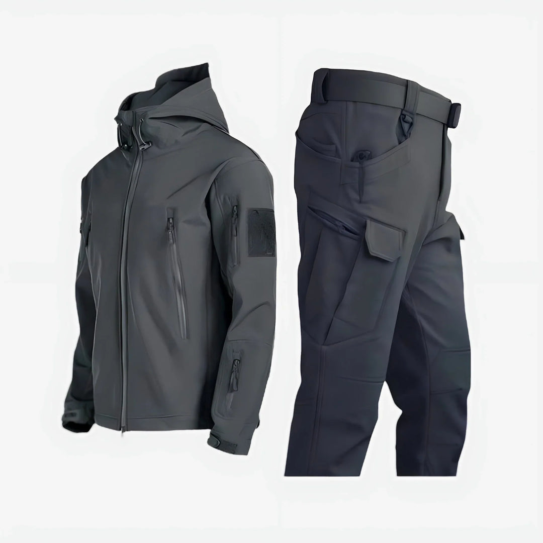 Women's insulated waterproof tactical set, hiking outfit for cold weather adventures.