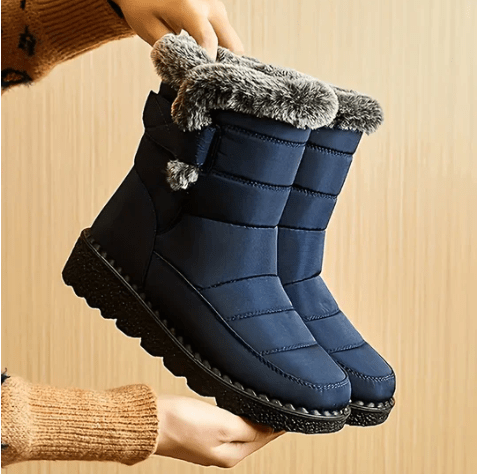 Women's waterproof winter ankle boots with warm lining, perfect for cold weather & everyday comfort.