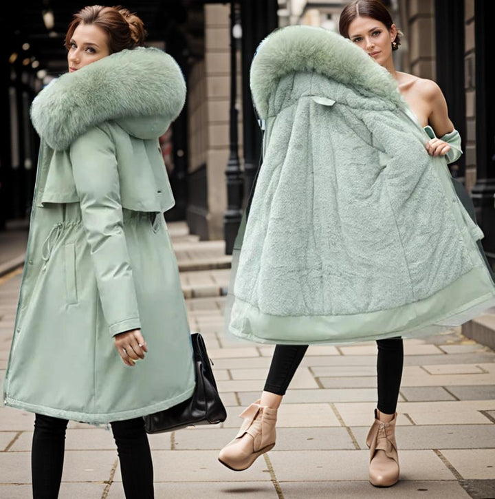 Stay warm and stylish in this women's waterproof winter coat. Insulated long jacket for ultimate cold weather protection.
