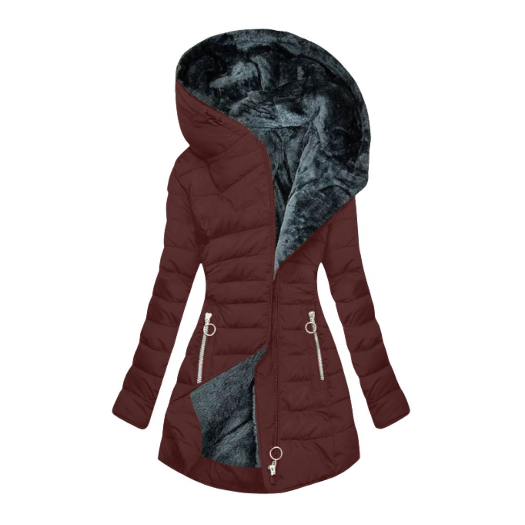 Woman enjoying outdoor activity in her warm waterproof winter coat, ideal cold weather outerwear.