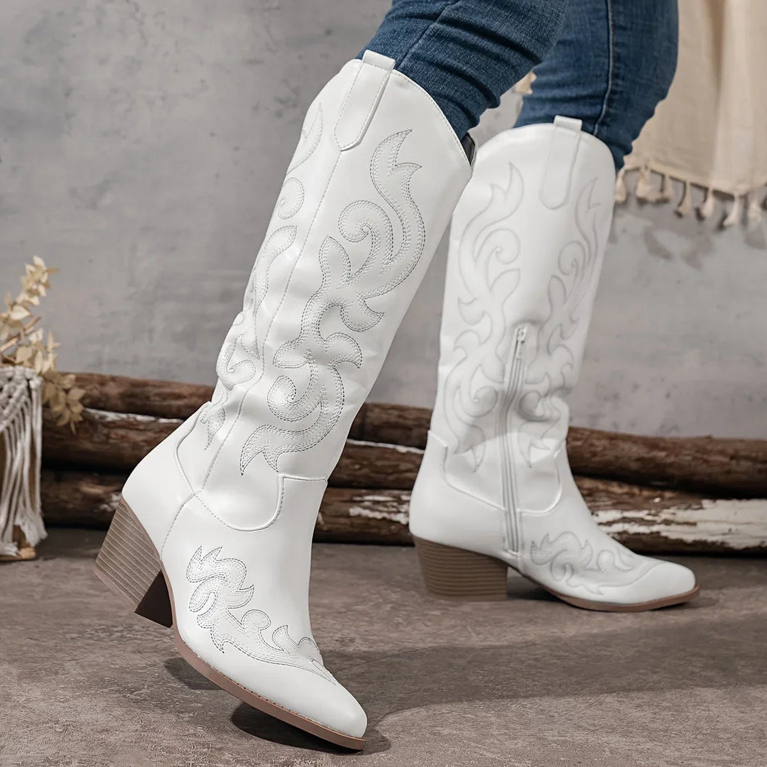 Women's stylish knee-high western boots, delicate embroidery, secure side zip.