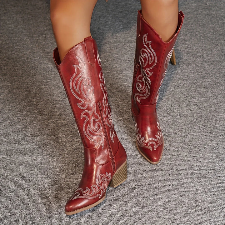Knee-high women's western boots, embroidered patterns, practical side zip access.
