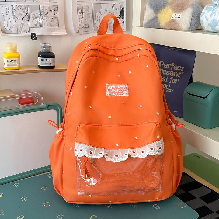 Stylish women's polka dot school bag, a whimsical travel or daily backpack with durable design.