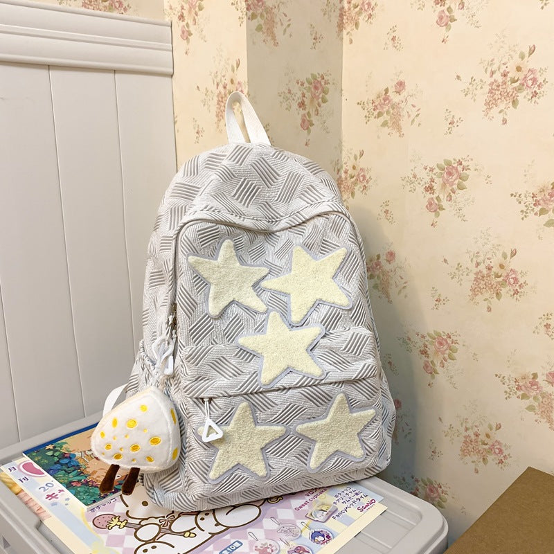 Cute and colorful star-embroidered backpack for women, perfect as a whimsical fashion accessory.