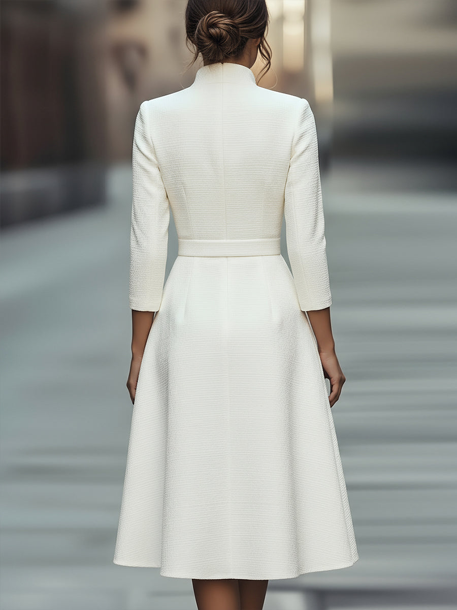 Women's white V-neck midi dress coat, an elegant belted design with a pleated skirt, perfect for formal & work occasions.