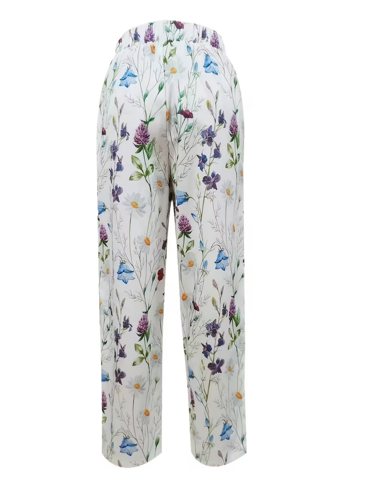 Comfortable women's floral summer pants with a relaxed fit, perfect for casual wear & vacations.