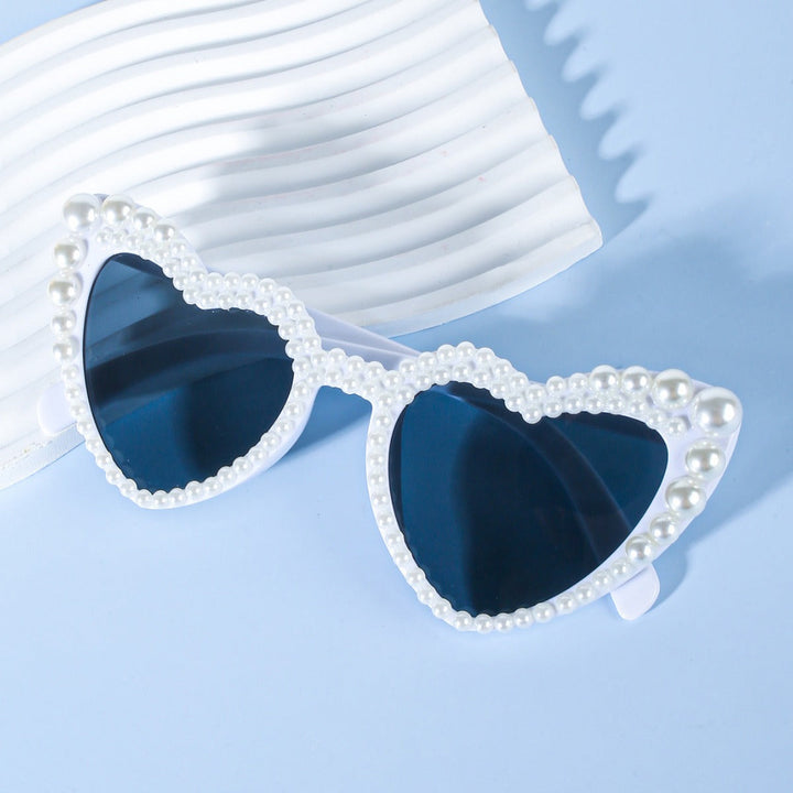 Women's white heart-shaped bridal sunglasses, perfect for 'Bride to Be' celebrations & bachelorette parties.