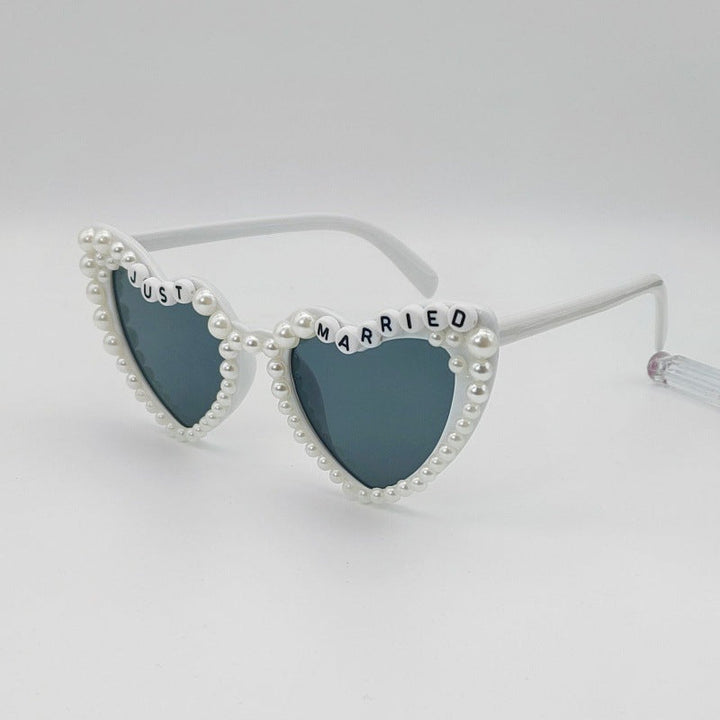 Versatile women's heart party sunglasses, suitable for bridal showers, bachelorette, and wedding day fun.