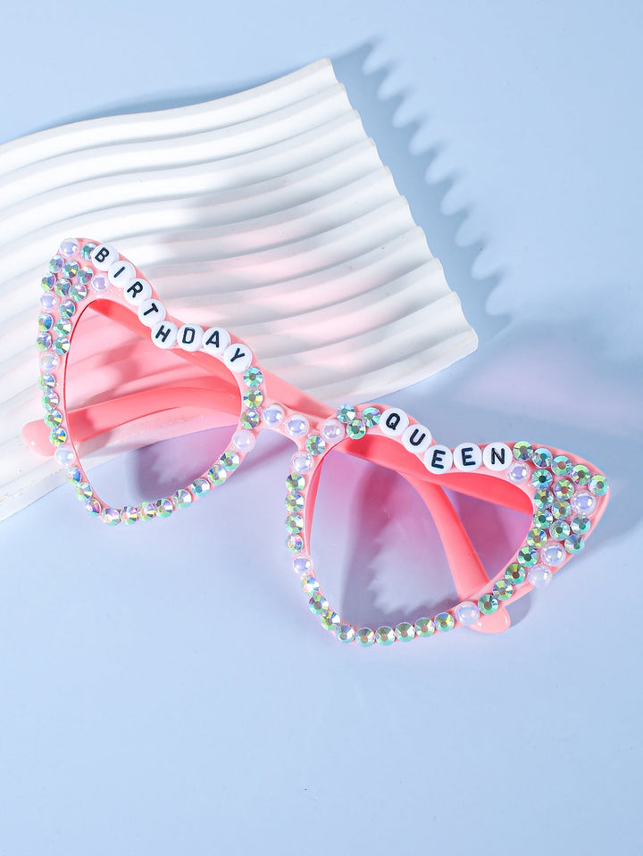 Glamorous pearl-embellished heart sunglasses for the bride-to-be, perfect for a bachelorette bash.