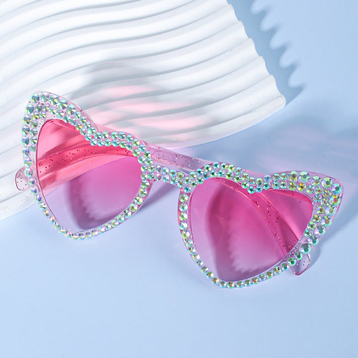 Elegant pearl heart sunglasses for women. A chic wedding accessory for the bride-to-be or bridal party.
