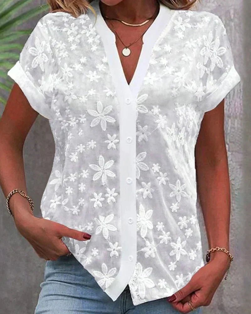Women's white lace embroidered short-sleeve button-down blouse with v-neck, perfect for spring & summer casual elegance.