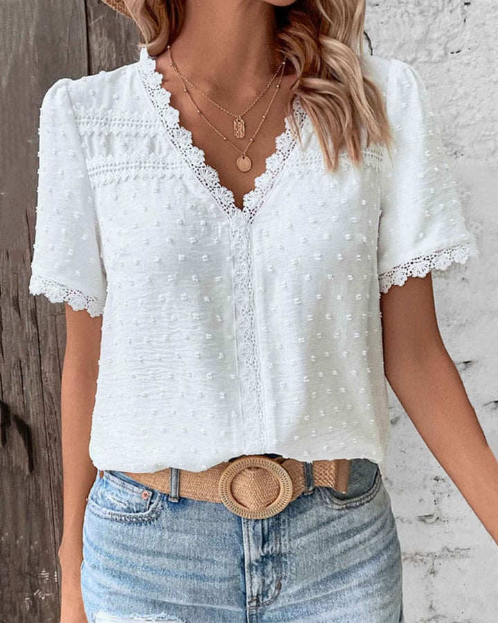 Women's white lace trim textured blouse with short sleeves and a relaxed fit, perfect for summer casual wear.