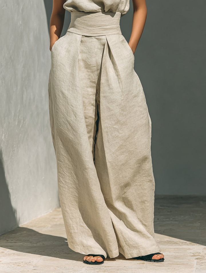 Breathable women's linen wide-leg pant set with a sleeveless roll neck blouse. Casual & comfortable summer wear.