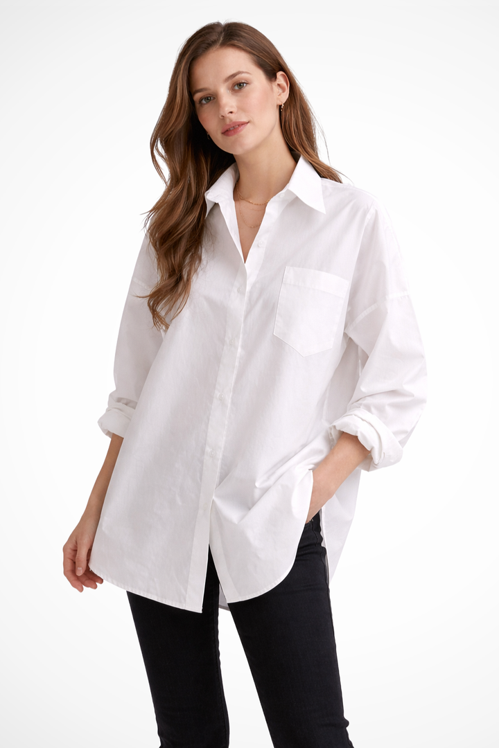 Women's white oversized button down blouse, long sleeve, relaxed fit for casual chic everyday wear.
