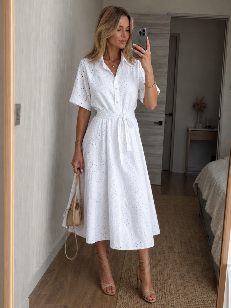 Women's white short sleeve button-front midi dress with waist tie. Perfect for effortless summer casual wear.