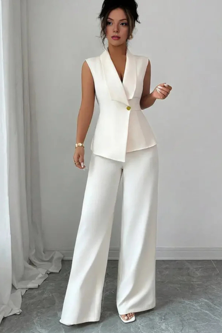 Minimalist white tailored suit set: women's sleeveless blazer & stylish wide leg trousers. Ideal for formal events.