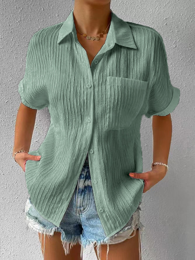 Green women's textured short sleeve shirt, a casual button-up blouse with a relaxed summer fit.