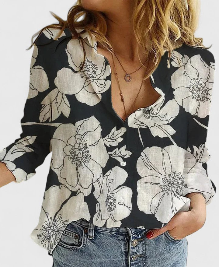 Women's relaxed fit V-neck blouse, button-down design for summer, combining casual comfort & style.
