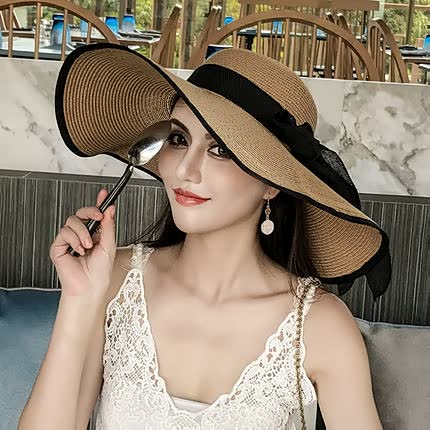 Protect your face in style with this women's wide brim straw sun hat, featuring a lovely bow for beach.